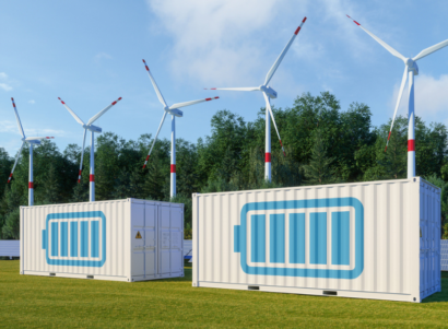 Energy storage system with solar panel, wind turbines and battery container.