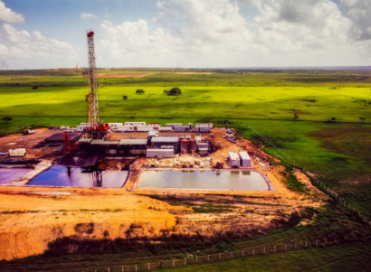 oil gas drilling rig in farm field